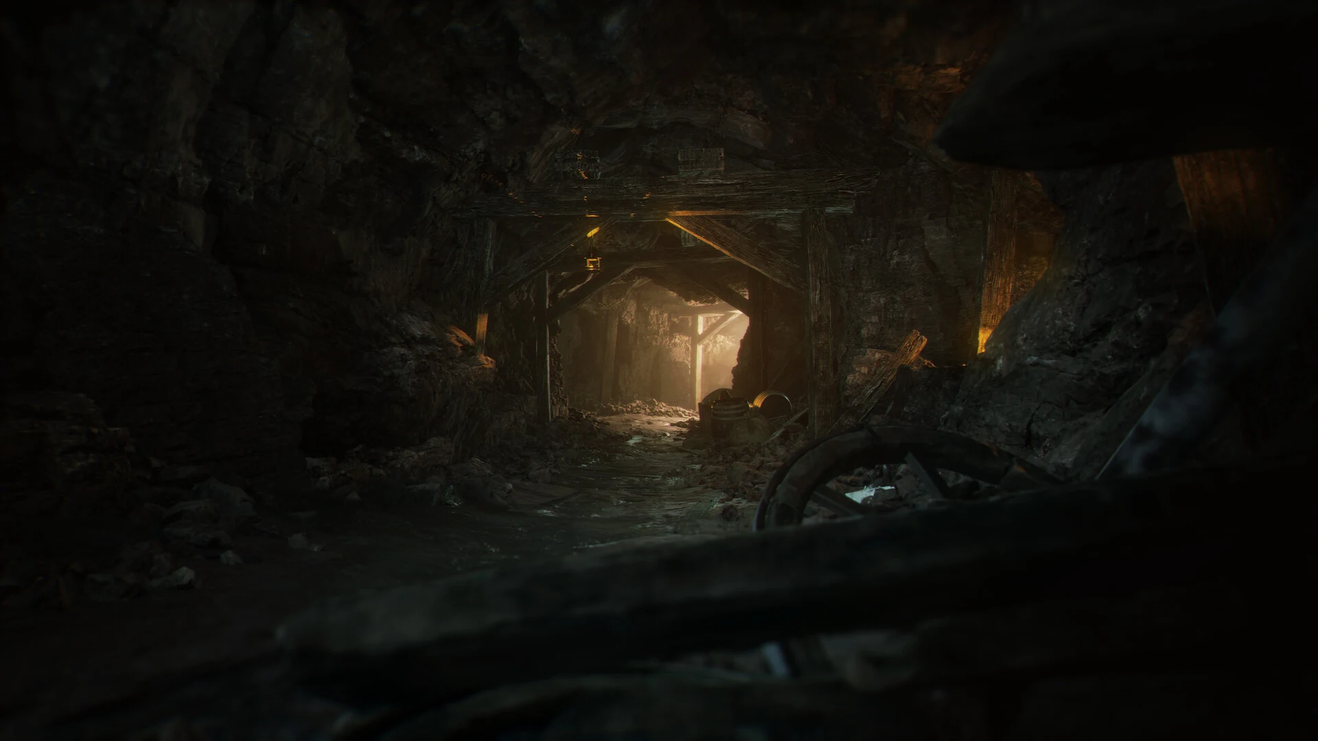 A torchlit passage beneath the mountains
